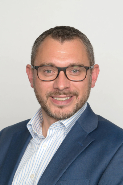 Headshot of Adam Thomas